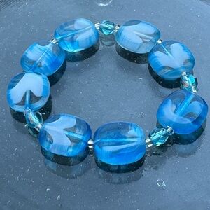 Handmade blue swirl beaded stretch bracelet with hand blown glass beads
